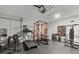 Spacious garage is equipped with fitness equipment for convenient at-home workouts at 3266 Lanai Ave, North Port, FL 34288