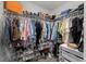 Spacious walk-in closet providing ample storage space for clothing and shoes at 3266 Lanai Ave, North Port, FL 34288