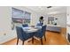 Inviting dining space featuring a round table, comfortable seating, and ample light at 3758 59Th W Ave # 4099, Bradenton, FL 34210