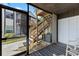 Outdoor patio area provides seating and storage, just steps from the wooden stairs at 3758 59Th W Ave # 4099, Bradenton, FL 34210