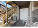 The exterior patio has seating and outdoor storage space, right next to the stairway at 3758 59Th W Ave # 4099, Bradenton, FL 34210