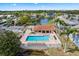 An aerial view of the community pool and surrounding amenities shows this community's resort-style setting at 3758 59Th W Ave # 4099, Bradenton, FL 34210