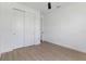 Bedroom featuring tile flooring and white walls with a closet at 3807 Las Vegas Ave, North Port, FL 34288