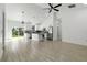 Open floor plan featuring a bright kitchen with a large island and stainless appliances at 3807 Las Vegas Ave, North Port, FL 34288