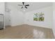 Bright living space with tile floors and a large window for lots of natural light at 3807 Las Vegas Ave, North Port, FL 34288