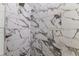Modern shower featuring decorative marble tile at 3807 Las Vegas Ave, North Port, FL 34288
