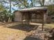 Backyard featuring a pergola in yard with an outside wall at 3855 43Rd N Ter, St Petersburg, FL 33714