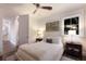 Comfortable bedroom featuring a queen bed, nightstands, and natural light at 3916 N Shell Rd, Sarasota, FL 34242