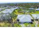 Beautiful aerial view of the community with lush greenery and community pool at 4220 Center Pointe Ln # 21, Sarasota, FL 34233