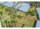 Aerial view showing a house surrounded by mature trees and well-kept lawns in a serene community at 4220 Center Pointe Ln # 21, Sarasota, FL 34233