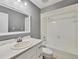 Bathroom featuring a shower-tub combo and updated vanity with marble countertop at 4220 Center Pointe Ln # 21, Sarasota, FL 34233