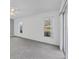 Well-lit bedroom with neutral carpet, and a sliding door to the outdoors, perfect for relaxing at 4220 Center Pointe Ln # 21, Sarasota, FL 34233