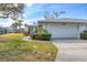 Lovely single-story home with an attached garage and a well-maintained lawn at 4220 Center Pointe Ln # 21, Sarasota, FL 34233