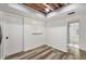 Bright kitchen area with wood grain floors, and adjacent access to a bedroom area at 4220 Center Pointe Ln # 21, Sarasota, FL 34233
