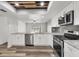 A well lit kitchen features stainless steel appliances, modern countertops, and an open layout at 4220 Center Pointe Ln # 21, Sarasota, FL 34233