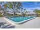Inviting community pool with a poolside cabana and clear blue water for relaxation at 4220 Center Pointe Ln # 21, Sarasota, FL 34233