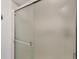 Close up of the sliding glass doors to the shower at 4220 Center Pointe Ln # 21, Sarasota, FL 34233