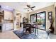 Cozy dining area adjacent to a screened pool deck, with great natural light and stylish accents at 4386 Library St, Port Charlotte, FL 33948