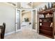 Bright office with French doors leading to the living room and high ceilings at 4386 Library St, Port Charlotte, FL 33948