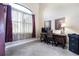 Spacious home office with natural light and elegant furnishings at 4386 Library St, Port Charlotte, FL 33948