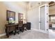 Office space with custom desk, natural light, and peaceful ambiance at 4386 Library St, Port Charlotte, FL 33948