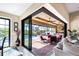 A large patio with a view of the pool and lake at 4386 Library St, Port Charlotte, FL 33948