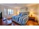 Inviting bedroom featuring a plush bed, soft lighting, and a calming atmosphere at 4425 45Th W Ave # 101, Bradenton, FL 34210