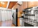 Kitchen with stainless steel appliances and wooden cabinets at 500 N Jefferson Ave # B2, Sarasota, FL 34237