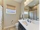 Bathroom with single vanity, with a shower and tub combo at 515 Honeyflower Loop, Bradenton, FL 34212