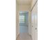 View of bedroom with neutral carpet, neutral paint and a view of nature at 5160 Northridge Rd # 302, Sarasota, FL 34238