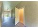 Hallway of building with door to unit visible in alcove at 5160 Northridge Rd # 302, Sarasota, FL 34238