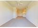 Open living area with neutral carpet, and seamless flow to kitchen at 5160 Northridge Rd # 302, Sarasota, FL 34238