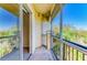 Covered patio with screen overlooking the surrounding mature vegetation at 5160 Northridge Rd # 302, Sarasota, FL 34238