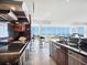 Bright, contemporary kitchen features ocean views, modern appliances, and stylish finishes at 534 Beach Rd, Sarasota, FL 34242