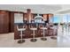 Gourmet kitchen features modern appliances, breakfast bar, and stunning counter top at 534 Beach Rd, Sarasota, FL 34242