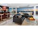 Open-concept living area with ocean views, modern furnishings, and a seamless indoor-outdoor flow at 534 Beach Rd, Sarasota, FL 34242