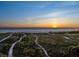 A beautiful scenic landscape showcasing a stunning ocean view at sunset at 534 Beach Rd, Sarasota, FL 34242