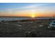A stunning scenic landscape showcasing a breathtaking ocean view at sunset at 534 Beach Rd, Sarasota, FL 34242