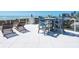 Rooftop terrace with comfortable chairs and tables with a relaxing view of ocean, creating a serene outdoor living space at 534 Beach Rd, Sarasota, FL 34242