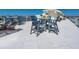 Rooftop deck featuring patio sets offering stunning views, creating an ideal space for entertaining and enjoying coastal sunsets at 534 Beach Rd, Sarasota, FL 34242