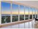 Windows showcasing a gorgeous beach sunset view at 534 Beach Rd, Sarasota, FL 34242