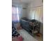 This bright bedroom offers a crib with a closet at 540 Palmetto Ne Dr, Port Charlotte, FL 33952