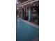 Inviting pool with outdoor entertaining and wind chimes at 540 Palmetto Ne Dr, Port Charlotte, FL 33952