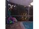 Bright pool with brick paver and pool toys on deck at 540 Palmetto Ne Dr, Port Charlotte, FL 33952