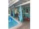 A refreshing pool area with a covered patio and open-air design, perfect for relaxing and entertaining at 540 Palmetto Ne Dr, Port Charlotte, FL 33952