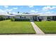 Attractive home with manicured lawn and inviting entryway, situated in a great neighborhood at 6902 8Th W Ave, Bradenton, FL 34209