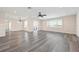 Spacious living room with abundant natural light and wood flooring at 6902 8Th W Ave, Bradenton, FL 34209
