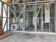 Interior framing of a building with metal studs, electrical boxes and hvac ductwork at 6970 Beckwith Ave, North Port, FL 34291
