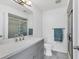 Modern bathroom featuring updated vanity, countertop, and walk-in shower at 7402 8Th W Ave, Bradenton, FL 34209