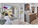 Bright kitchen with stainless steel appliances and view of outdoor patio at 7402 8Th W Ave, Bradenton, FL 34209